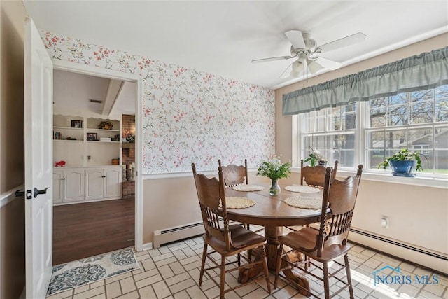 124 Miller Ave, Archbold, OH 43502 - dining area featuring wallpapered walls, baseboard heating, a ceiling fan, and baseboards