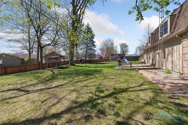 124 Miller Ave, Archbold, OH 43502 - view of yard featuring a playground and a wooden deck