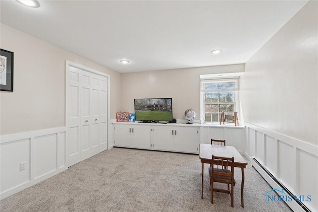 124 Miller Ave, Archbold, OH 43502 - sitting room featuring baseboard heating, light carpet, wainscoting, a decorative wall, and recessed lighting