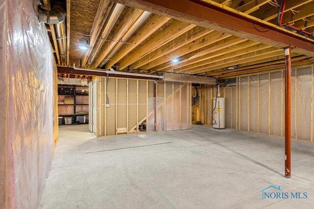 7704 Lonetree Ct, Maumee, OH 43537 - unfinished below grade area featuring gas water heater