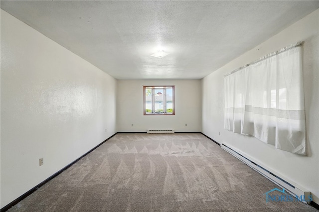 13417 Center St, Weston, OH 43569 - spare room featuring a baseboard radiator, baseboards, a textured ceiling, and carpet floors