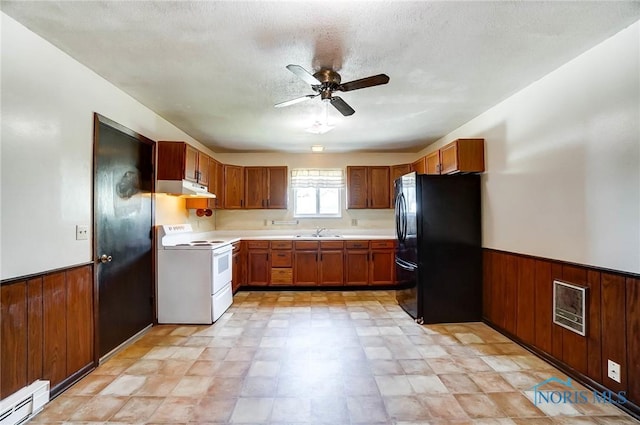 13417 Center St, Weston, OH 43569 - kitchen featuring wainscoting, white electric range oven, wooden walls, and freestanding refrigerator
