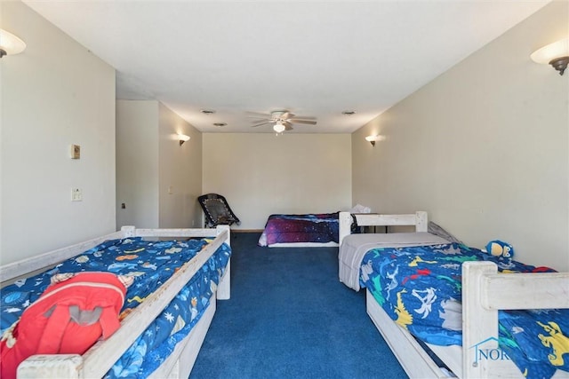 carpeted bedroom with a ceiling fan