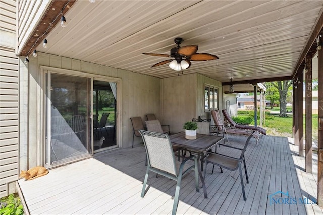 deck with a ceiling fan and outdoor dining space