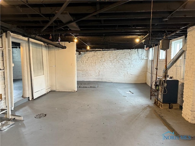 below grade area with a heating unit