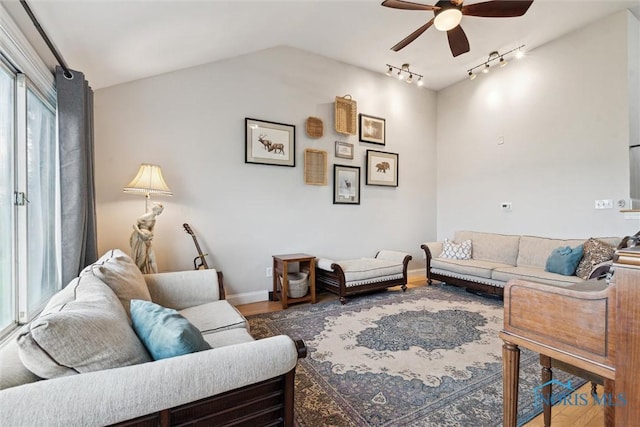 24203 W Reservation Line Rd, Curtice, OH 43412 - living area with baseboards, ceiling fan, rail lighting, and wood finished floors
