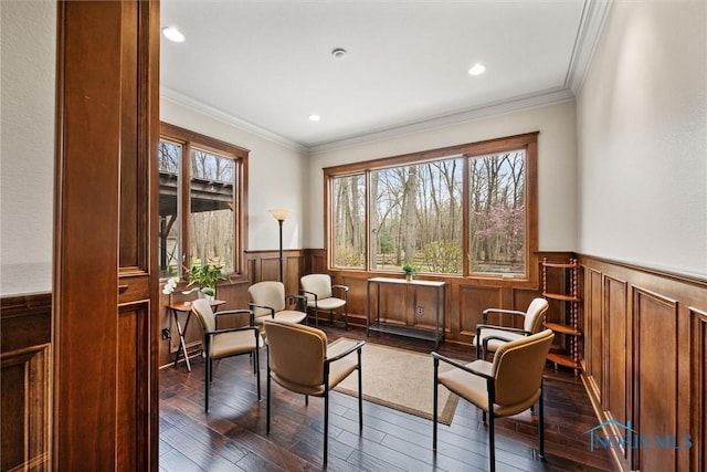10915 Reed Rd, Monclova, OH 43542 - living area with ornamental molding, recessed lighting, wainscoting, and dark wood finished floors