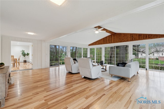 19788 Otsego Pike, Bowling Green, OH 43402 - living room featuring ceiling fan, lofted ceiling with beams, and light wood-style flooring