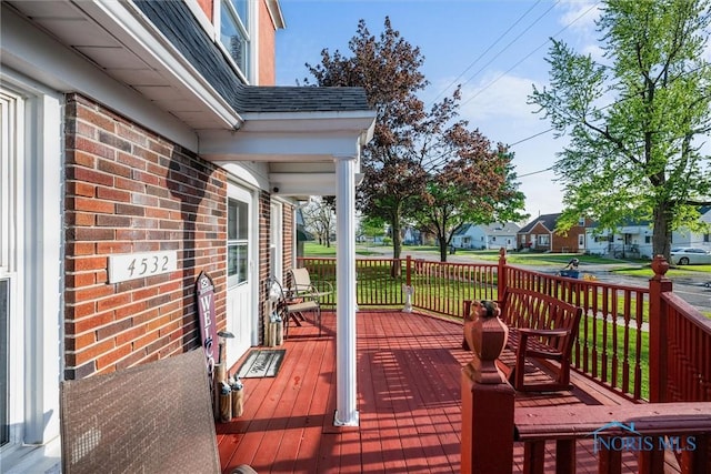 4532 290th St, Toledo, OH 43611 - wooden deck with a residential view