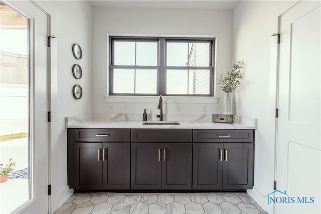 bar featuring a sink