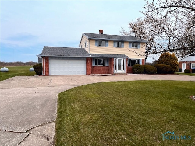 traditional-style house with a front lawn, brick siding, driveway, a chimney, and an attached garage