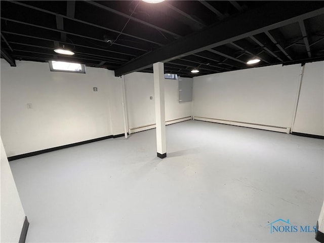 basement featuring baseboard heating