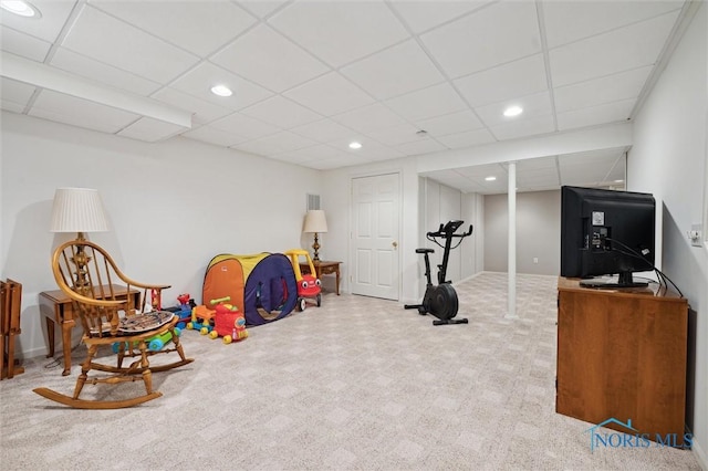 recreation room featuring recessed lighting, carpet flooring, and a drop ceiling