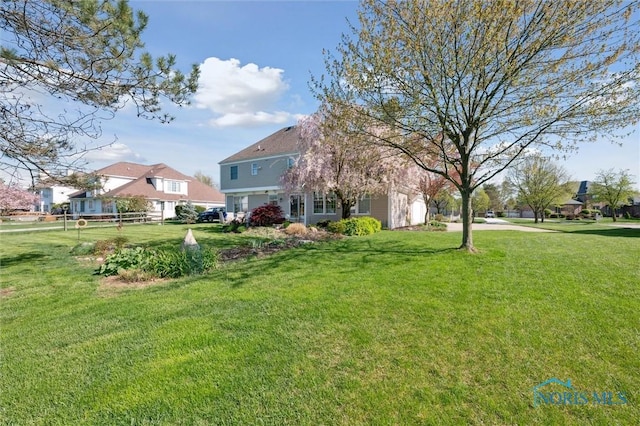 view of yard with fence