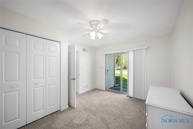 8 Zachary Cir, Waterville, OH 43566 - unfurnished bedroom featuring visible vents, a closet, light carpet, and access to exterior