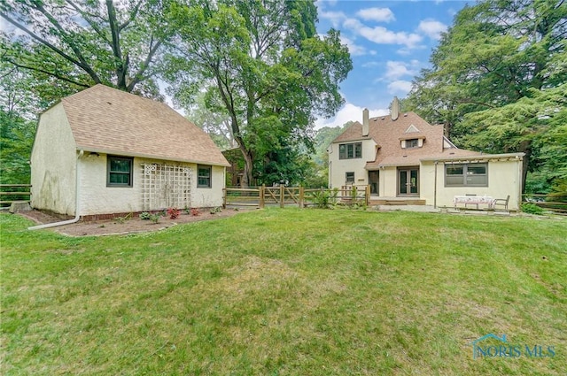 3533 Edgevale Rd, Ottawa Hills, OH 43606 - view of yard featuring french doors and fence