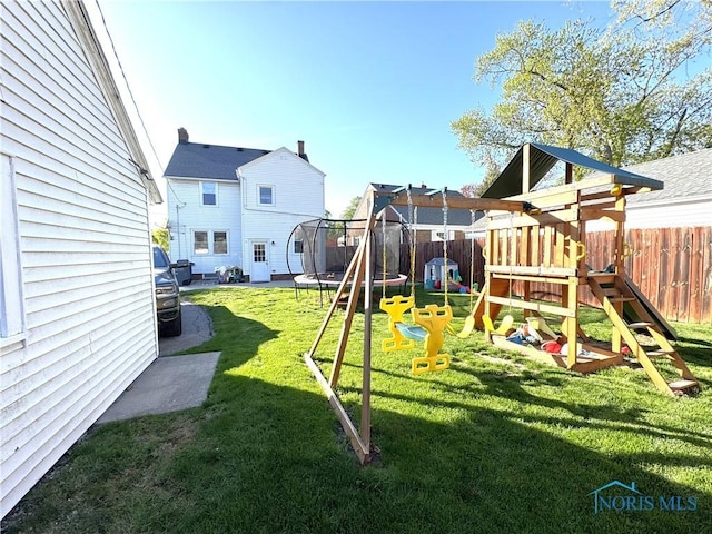 1805 Heatherdowns Blvd, Toledo, OH 43614 - view of playground with a trampoline