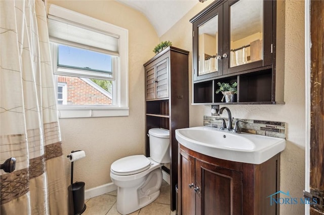 1805 Heatherdowns Blvd, Toledo, OH 43614 - bathroom with toilet, vanity, tile patterned floors, a textured wall, and baseboards