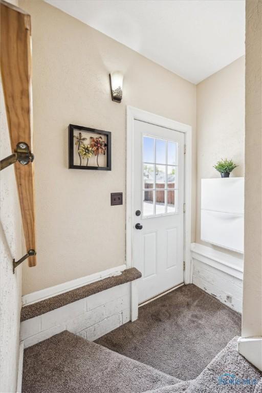 1805 Heatherdowns Blvd, Toledo, OH 43614 - doorway to outside with carpet flooring