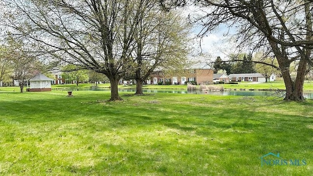 view of yard with a water view