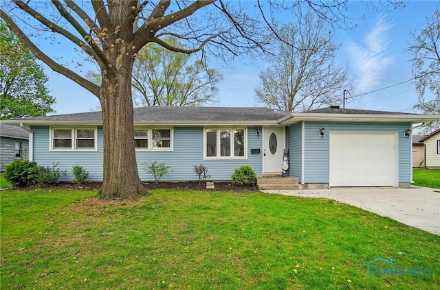 ranch-style home with a garage, a front lawn, and concrete driveway