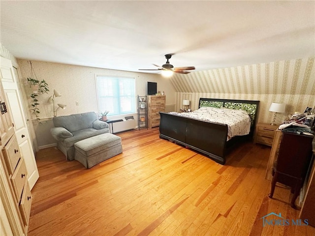 399 Melmore St, Tiffin, OH 44883 - bedroom featuring wallpapered walls, a ceiling fan, and light wood-style floors