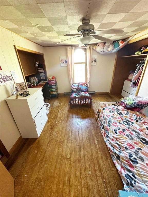 399 Melmore St, Tiffin, OH 44883 - bedroom featuring light wood-style flooring and baseboards