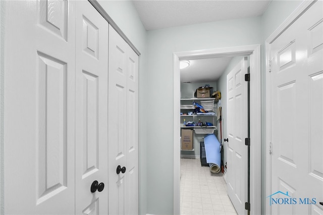 interior space featuring baseboards