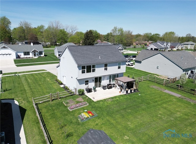 drone / aerial view with a residential view