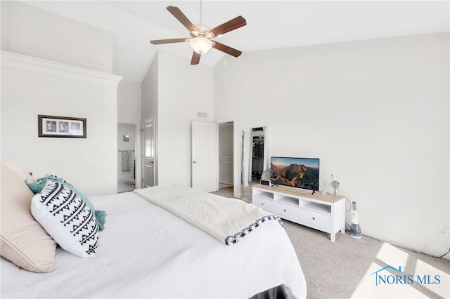 bedroom with carpet floors, a ceiling fan, high vaulted ceiling, and visible vents