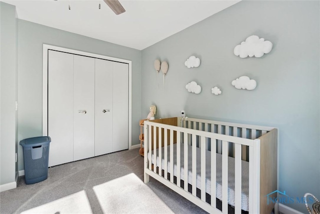 544 Jacqueline Ct, Holland, OH 43528 - carpeted bedroom featuring a nursery area, a closet, baseboards, and a ceiling fan