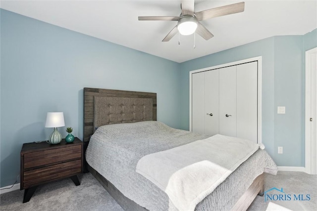 544 Jacqueline Ct, Holland, OH 43528 - carpeted bedroom with a closet, a ceiling fan, and baseboards