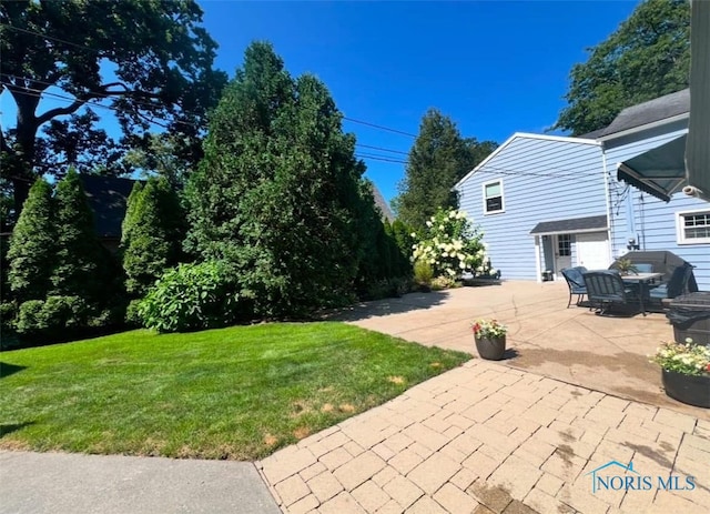 view of yard with a patio area