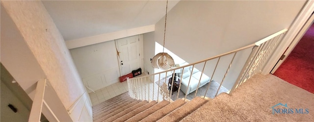 1773 Valley Way Dr, Toledo, OH 43614 - stairway with carpet and high vaulted ceiling