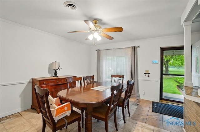 705 Reineck Dr, Toledo, OH 43605 - dining room featuring crown molding, light tile patterned floors, ceiling fan, and visible vents