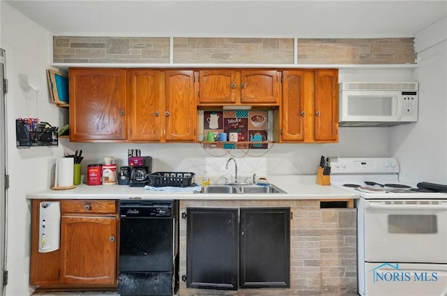 705 Reineck Dr, Toledo, OH 43605 - kitchen featuring a sink, light countertops, open shelves, and white appliances