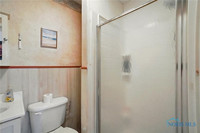 705 Reineck Dr, Toledo, OH 43605 - full bathroom featuring toilet, a shower stall, and vanity