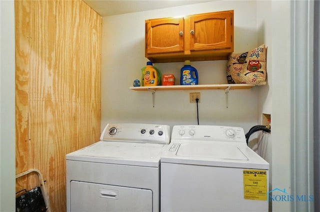 705 Reineck Dr, Toledo, OH 43605 - washroom featuring cabinet space and washing machine and dryer