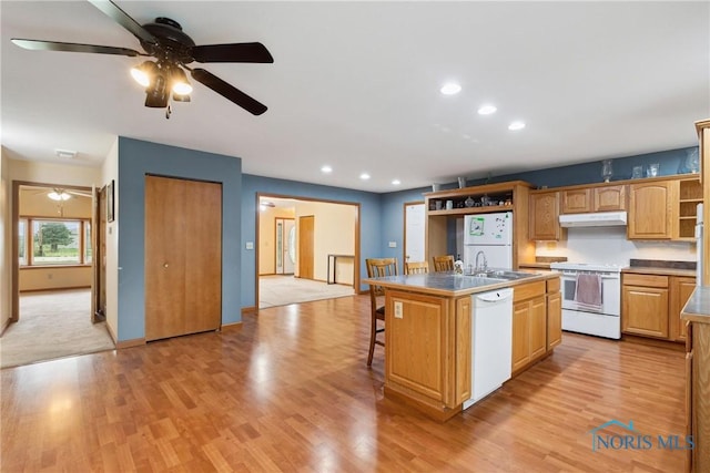 kitchen with a ceiling fan, open shelves, a sink, under cabinet range hood, and white appliances