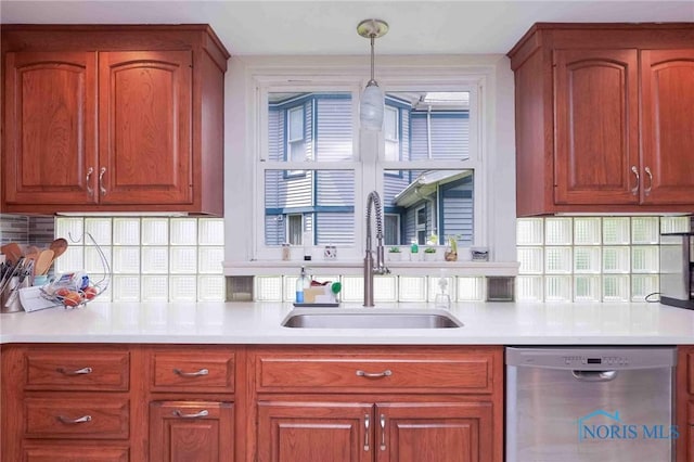 202 Hancock St, Findlay, OH 45840 - kitchen featuring dishwasher, a sink, light countertops, and backsplash
