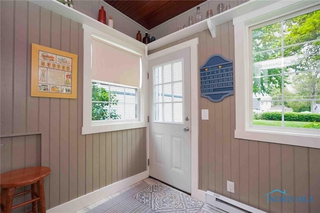202 Hancock St, Findlay, OH 45840 - doorway with wooden walls and baseboard heating