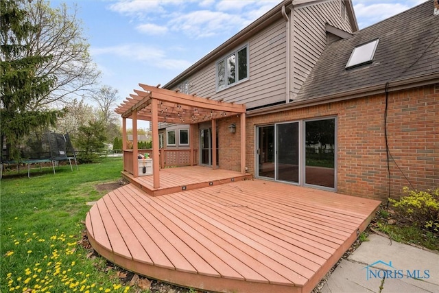 6142 Welsford Ct, Maumee, OH 43537 - deck with a lawn, a trampoline, and a pergola