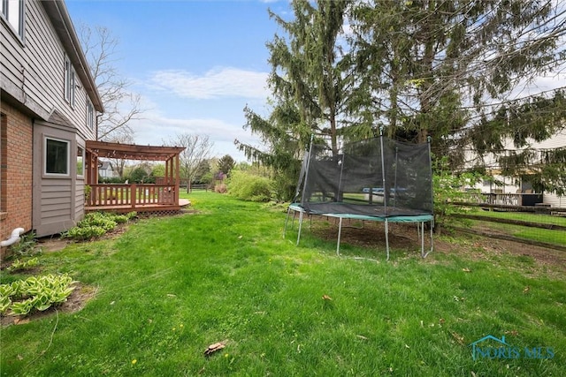 6142 Welsford Ct, Maumee, OH 43537 - view of yard with a deck, a pergola, fence, and a trampoline