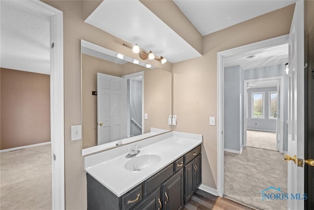6142 Welsford Ct, Maumee, OH 43537 - bathroom featuring baseboards and vanity