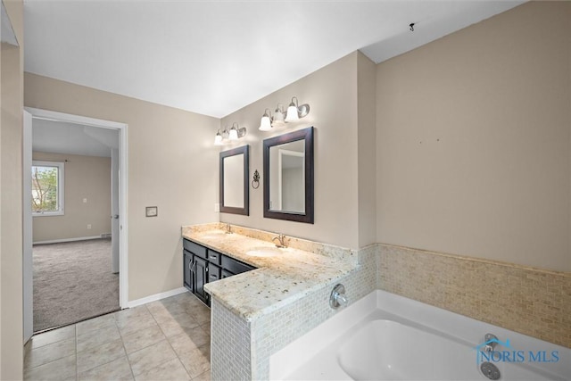6142 Welsford Ct, Maumee, OH 43537 - bathroom featuring double vanity, a sink, a bath, and tile patterned flooring