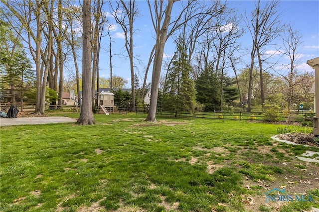 view of yard with fence