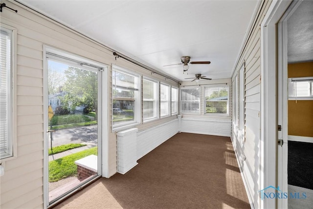 4242 Fairview Dr, Toledo, OH 43612 - unfurnished sunroom with carpet flooring and a ceiling fan