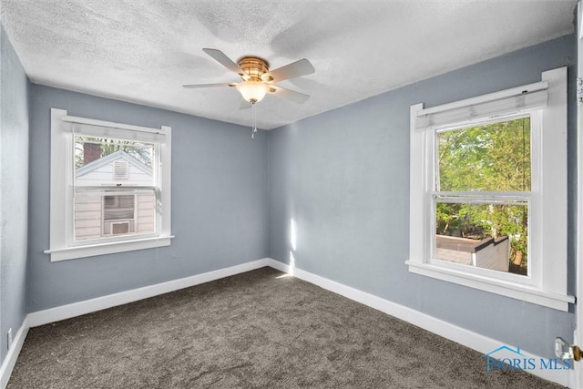 4242 Fairview Dr, Toledo, OH 43612 - spare room featuring carpet floors, a ceiling fan, baseboards, and a textured ceiling