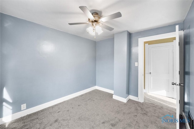 4242 Fairview Dr, Toledo, OH 43612 - unfurnished bedroom featuring carpet flooring, baseboards, and a ceiling fan