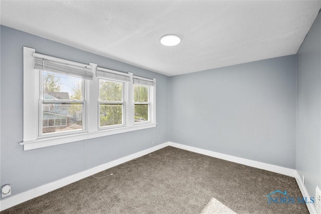4242 Fairview Dr, Toledo, OH 43612 - carpeted empty room with baseboards